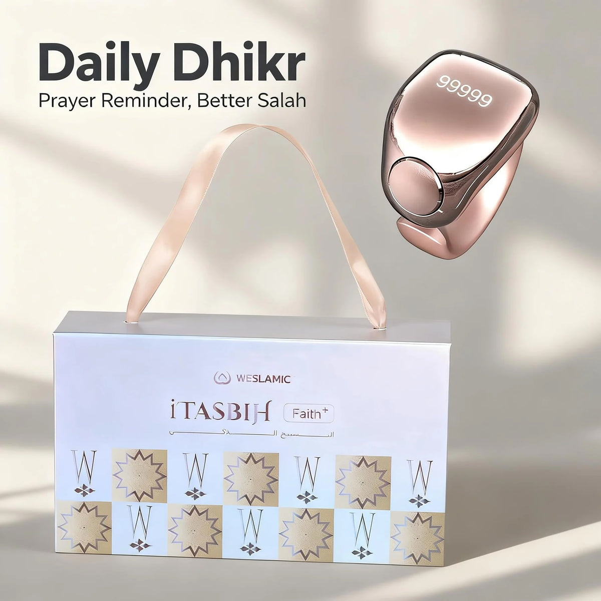 Rose gold prayer reminder device with packaging on a light background